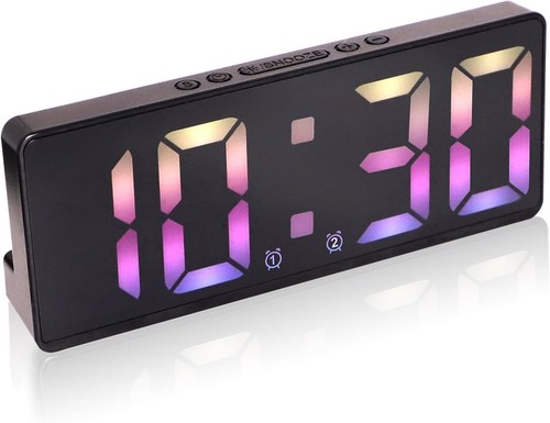 Digital alarm clock with dual - clock,